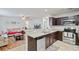 Modern kitchen featuring stainless steel appliances, granite countertops, and dark wood cabinetry at 121 Keaton Brook Dr, Summerville, SC 29485