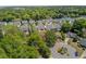 Aerial view of a community in a wooded area showcasing the home's location on a cul-de-sac at 1224 Decoy Ct, Mount Pleasant, SC 29464
