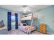 Bedroom featuring a bunk bed, wood-look floors, a ceiling fan, a window, and a white chest of drawers at 1224 Decoy Ct, Mount Pleasant, SC 29464