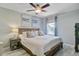 Serene bedroom featuring a large bed, natural light, and stylish decor at 1224 Decoy Ct, Mount Pleasant, SC 29464