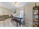 Dining area with modern table, comfortable seating, and view of living space at 1224 Decoy Ct, Mount Pleasant, SC 29464