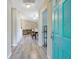 Bright entryway with modern flooring and a glimpse into the living and dining areas at 1224 Decoy Ct, Mount Pleasant, SC 29464