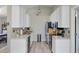 Modern kitchen featuring stainless steel appliances and sleek white cabinets at 1224 Decoy Ct, Mount Pleasant, SC 29464