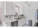 Bright kitchen showcasing stainless steel appliances and marble countertops at 1224 Decoy Ct, Mount Pleasant, SC 29464