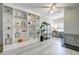 Bright living room with built-in shelving and a functional workspace at 1224 Decoy Ct, Mount Pleasant, SC 29464