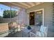 Relaxing screened patio with comfortable seating and string lights at 1224 Decoy Ct, Mount Pleasant, SC 29464
