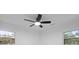 Simple, brightly lit room featuring a ceiling fan and windows providing ample natural light at 1228 Penny Cir, Mount Pleasant, SC 29464