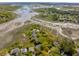 Expansive aerial view of waterfront community with marsh and channel views with many boardwalks at 1483 Harborsun Dr, Charleston, SC 29412