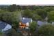 Aerial view of a home in a wooded area, featuring a deck and outdoor living space at 1483 Harborsun Dr, Charleston, SC 29412
