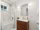 Stylish bathroom with modern vanity, marble tiling, shower, and modern fixtures offers a relaxing spa-like experience at 1483 Harborsun Dr, Charleston, SC 29412