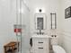 Bathroom featuring a glass enclosed shower with a modern vanity and black hardware at 1483 Harborsun Dr, Charleston, SC 29412
