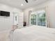 Bedroom features a large window with neutral colored walls and carpeted floors at 1483 Harborsun Dr, Charleston, SC 29412