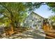 Charming two-story home with a manicured lawn and a paved driveway at 1483 Harborsun Dr, Charleston, SC 29412
