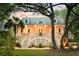 Charming home with a large porch, dual staircases, and inviting curb appeal at 1483 Harborsun Dr, Charleston, SC 29412