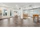 Finished garage space with gray floors, games, and a door to the exterior at 1483 Harborsun Dr, Charleston, SC 29412