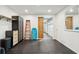 Organized garage with storage cabinets, work bench, and sturdy rubber flooring for a functional and tidy space at 1483 Harborsun Dr, Charleston, SC 29412