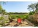 Relaxing outdoor deck with seating and scenic marshland views at 1483 Harborsun Dr, Charleston, SC 29412