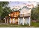 Beautiful home featuring a screened porch, a deck, and outdoor access from the lower level at 1483 Harborsun Dr, Charleston, SC 29412