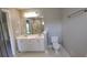 Bathroom featuring a double vanity, sleek fixtures, and a separate shower for a spa-like experience at 15 Muirfield Village Ct, Summerville, SC 29483