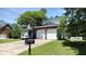 Lovely home with a two-car garage, inviting front porch, and neatly maintained lawn and landscaping at 15 Muirfield Village Ct, Summerville, SC 29483