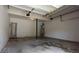 Spacious garage with overhead door and interior access door for added convenience at 15 Muirfield Village Ct, Summerville, SC 29483