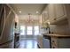 Bright kitchen features stainless steel appliances, natural wood counters, and a breakfast nook with abundant natural light at 15 Muirfield Village Ct, Summerville, SC 29483