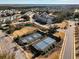 Aerial view featuring a community with tennis courts, sidewalks, pond and lovely landscaping at 1624 Prince Edward St, Mount Pleasant, SC 29466