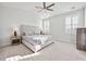 Serene bedroom with neutral tones, plush carpeting and large windows offering abundant natural light at 1624 Prince Edward St, Mount Pleasant, SC 29466