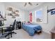 Bright bedroom with a playful theme, desk, and large window, ideal for a or teenager at 1624 Prince Edward St, Mount Pleasant, SC 29466