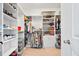 Spacious walk-in closet with custom shelving and ample storage for shoes, clothes, and accessories at 1624 Prince Edward St, Mount Pleasant, SC 29466