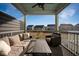 Relaxing covered patio with comfortable seating, offering scenic views of the neighborhood at 1624 Prince Edward St, Mount Pleasant, SC 29466