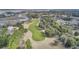 Picturesque aerial view of a golf course winding through the Dunes West community at 1634 Pin Oak Cut, Mount Pleasant, SC 29466