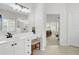 Bright bathroom featuring white cabinets, a vanity, and a view to the main bedroom at 1634 Pin Oak Cut, Mount Pleasant, SC 29466