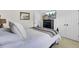 Comfortable bedroom featuring a bed with a soft throw, dresser, and TV at 1634 Pin Oak Cut, Mount Pleasant, SC 29466