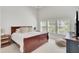 Comfortable bedroom showcasing natural light, a king bed, and neutral decor at 1634 Pin Oak Cut, Mount Pleasant, SC 29466