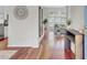 Inviting foyer featuring hardwood floors and an elegant console table at 1634 Pin Oak Cut, Mount Pleasant, SC 29466