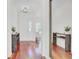 Welcoming foyer featuring hardwood floors and a decorative mirror at 1634 Pin Oak Cut, Mount Pleasant, SC 29466