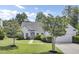 Charming single-story home with a well-manicured lawn and mature landscaping at 1634 Pin Oak Cut, Mount Pleasant, SC 29466
