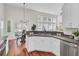 Open concept kitchen features stainless appliances and a dining nook with natural light at 1634 Pin Oak Cut, Mount Pleasant, SC 29466