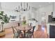 Open floorplan featuring living room and dining area with lots of natural light at 1634 Pin Oak Cut, Mount Pleasant, SC 29466