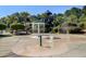 A splash pad with water features and a playset with a slide and tower in the background at 1634 Pin Oak Cut, Mount Pleasant, SC 29466