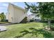 Well-maintained backyard with a lush lawn and mature trees providing shade and privacy at 1658 Pierce St, Charleston, SC 29492