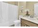 Bathroom featuring a vanity, shower with curtain, toilet, and a mounted shelf at 1658 Pierce St, Charleston, SC 29492