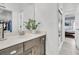 Bathroom features a modern vanity, a large mirror, and a glass-enclosed shower at 1658 Pierce St, Charleston, SC 29492
