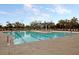 Spacious community pool with multiple lanes and lounge areas, perfect for swimming and relaxation at 1658 Pierce St, Charleston, SC 29492