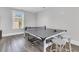 Game room with ping pong table, stylish stools, wood floors, and natural light at 1658 Pierce St, Charleston, SC 29492