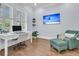 Bright home office with white desk, comfortable chair, and calming decor at 1658 Pierce St, Charleston, SC 29492