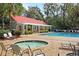 Charming pool house and jacuzzi next to the pool area, offering convenient amenities for residents at 1658 Pierce St, Charleston, SC 29492