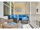 Relaxing screened porch offering comfortable wicker seating and views of the yard at 1658 Pierce St, Charleston, SC 29492