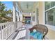 Inviting screened porch with comfortable seating and lots of natural light. Perfect for relaxation at 1658 Pierce St, Charleston, SC 29492